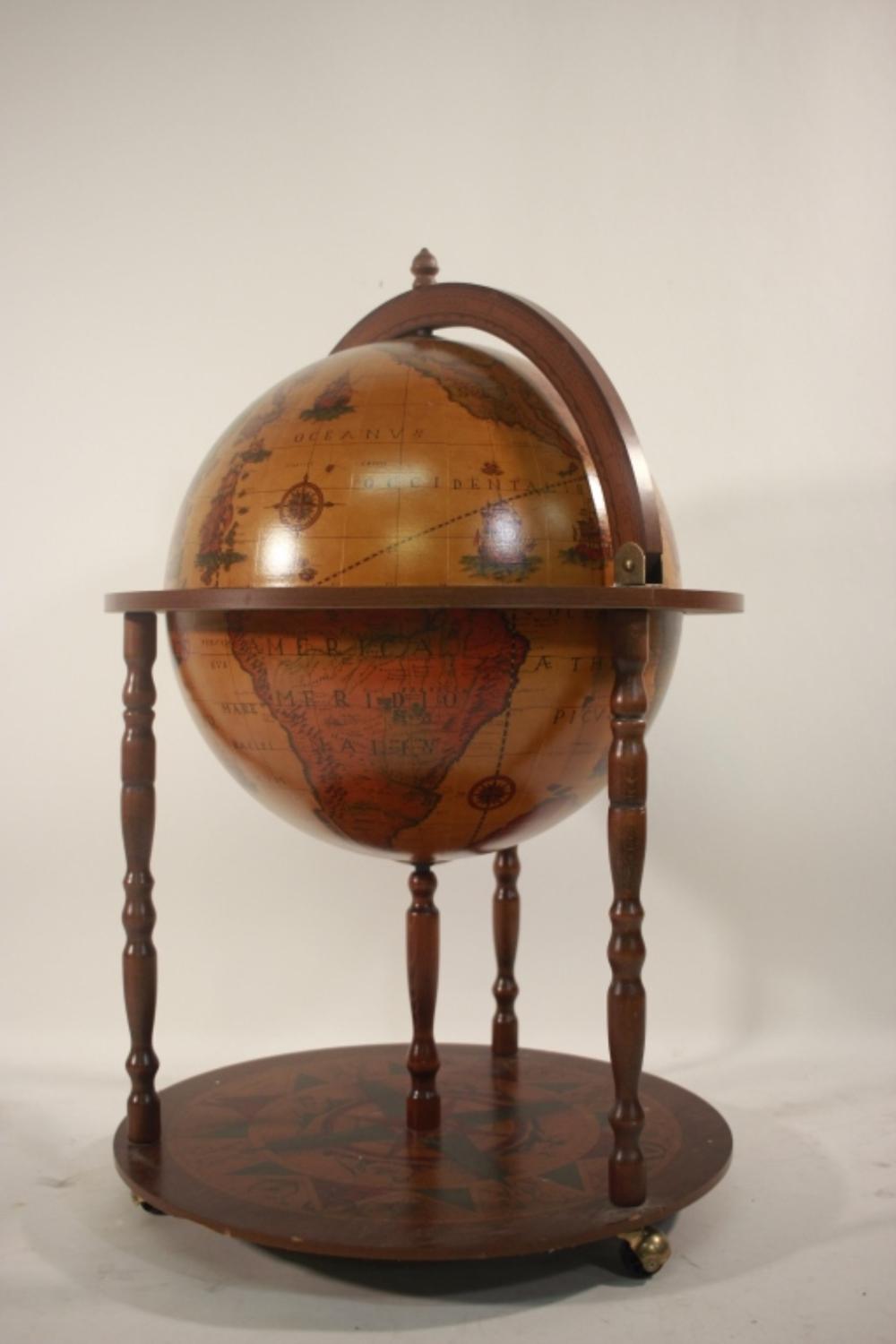 Appraisal: ITALIAN FLIP TOP GLOBE BARItalian globe on stand with flip