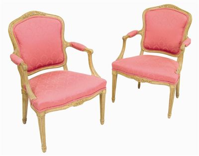 Appraisal: A pair of Louis XVI style carved beechwood fauteuil each