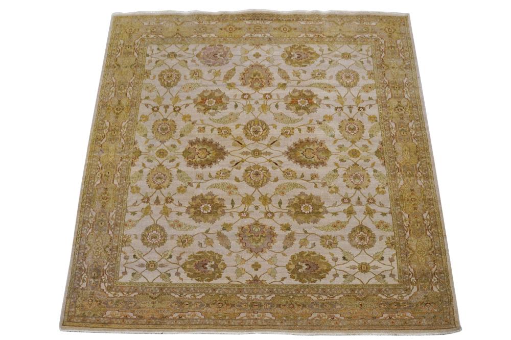 Appraisal: PAKISTANI BEIGE FIELD CARPETwool on cotton foundation Condition scattered small