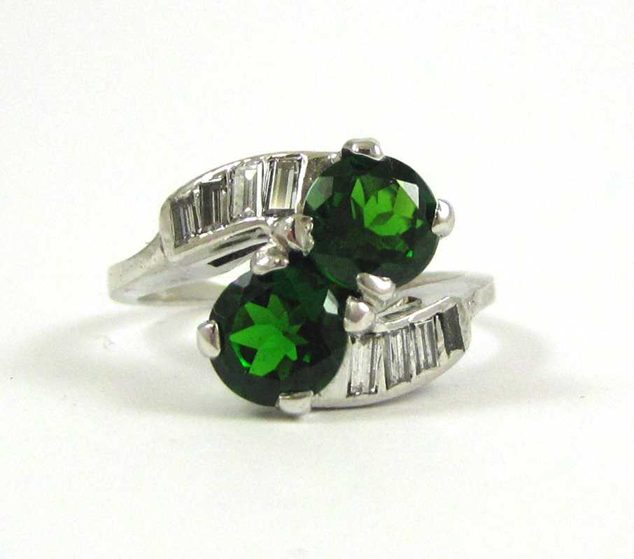 Appraisal: CHROME DIOPSIDE DIAMOND AND PLATINUM RING with a row of