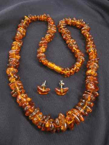 Appraisal: Amber Necklace Earrings natural beads '' long together with pierced