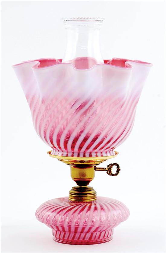 Appraisal: Cranberry glass table lamp white opalescent swirl design with ruffled