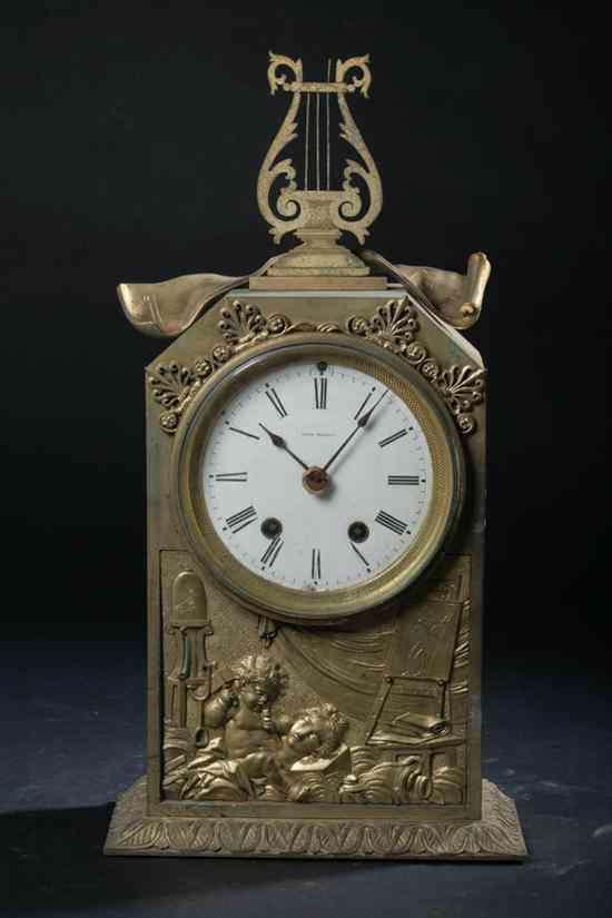 Appraisal: SETH THOMAS NEOCLASSICAL STYLE GILT-METAL UPRIGHT RECTANGULAR MANTLE CLOCK Front