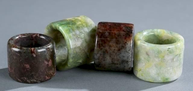 Appraisal: Group of Chinese hardstone thumb rings A group of Chinese