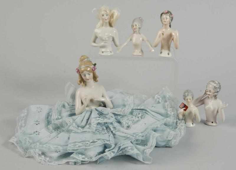 Appraisal: Lot of German Porcelain Half Dolls Description Jenny Lind with