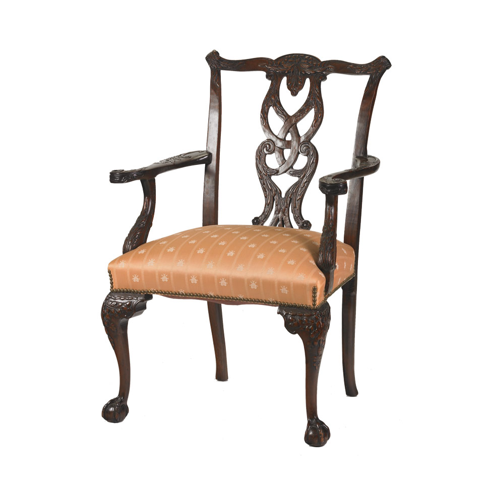 Appraisal: Carved Mahogany Arm Chair in the Chippendale manner th century