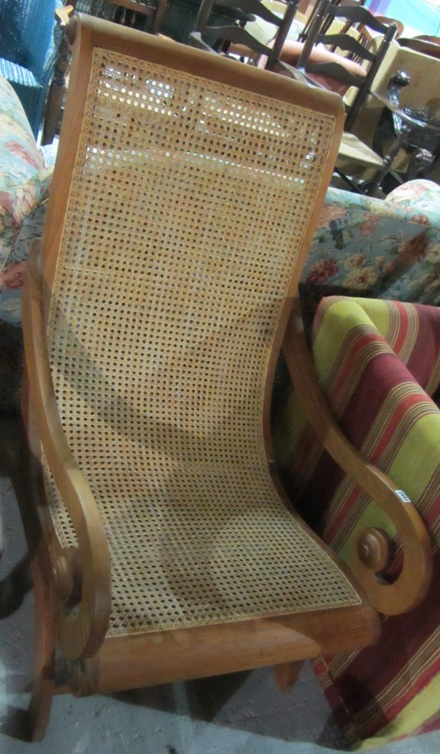 Appraisal: A th century teak armchair