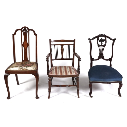 Appraisal: An Edwardian carved mahogany nursing chair an Edwardian mahogany and