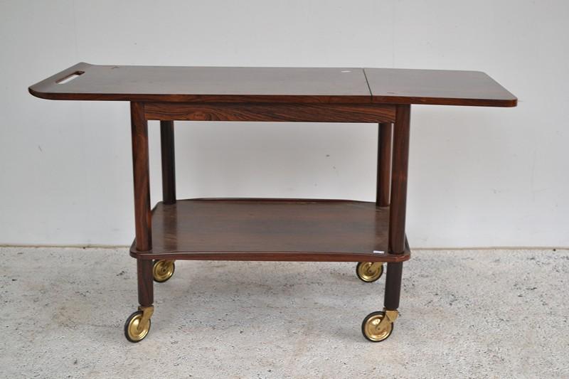 Appraisal: A DANISH ROSEWOOD DRINKS TROLLEY x x cm extended DANISH