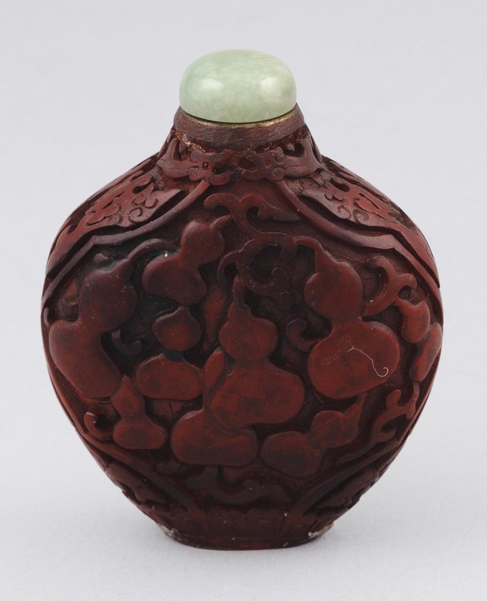 Appraisal: CHINESE CARVED CINNABAR SNUFF BOTTLE EARLY TH CENTURY HEIGHT CHINESE