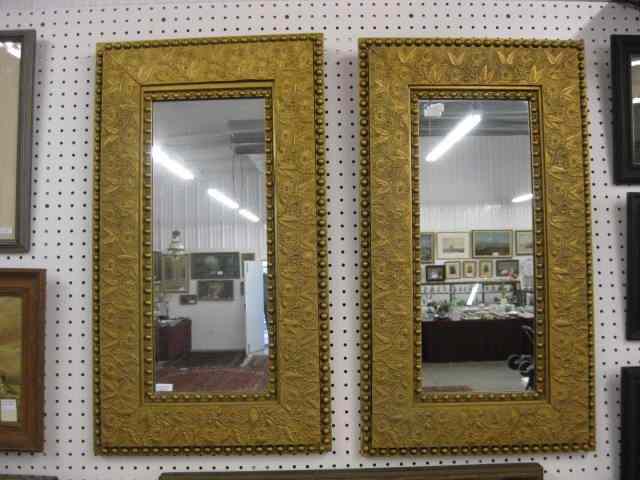 Appraisal: Pair of Aesthetic Movement Framed Mirrors elaborate floral berry gold