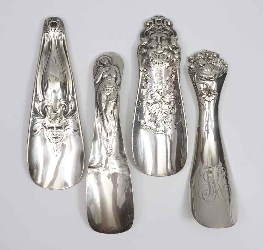 Appraisal: ART NOUVEAU STERLING SILVER SHOE HORNS To include Full woman's