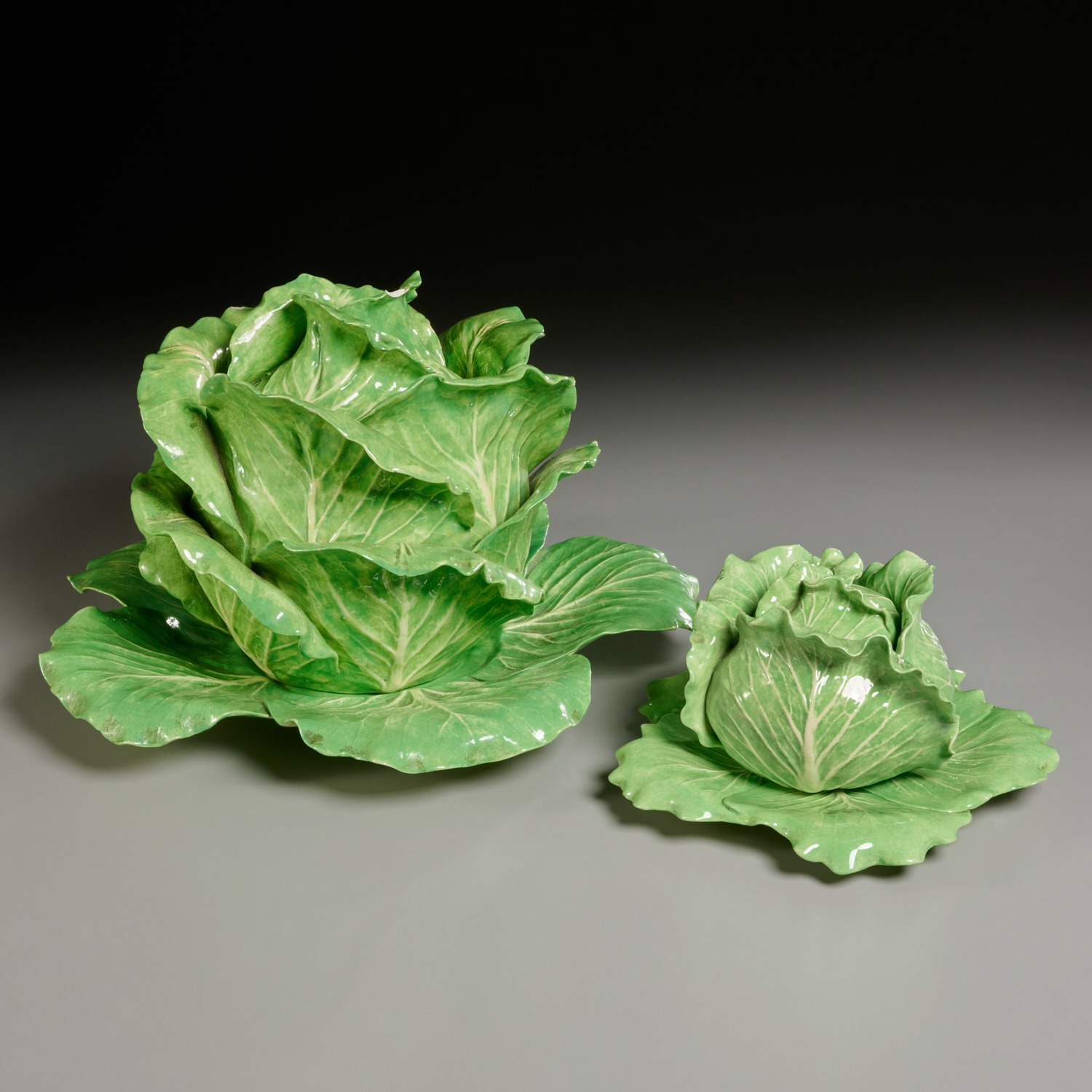 Appraisal: DODIE THAYER LIDDED LETTUCE WARE TUREENS c s American green