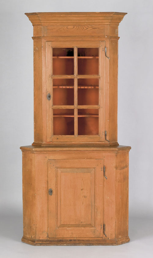 Appraisal: Pennsylvania yellow pine two part corner cupboard ca the molded