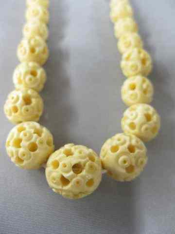 Appraisal: Carved Ivory Necklace graduated beads some fancy openwork '' long