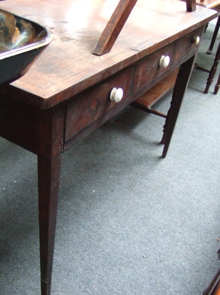 Appraisal: A th century mahogany writing table the cross banded top