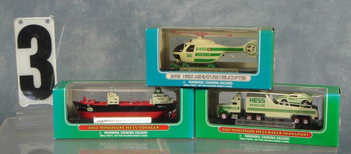 Appraisal: Hess Miniature trucks Racer Transport helicopter Voyager all mint in