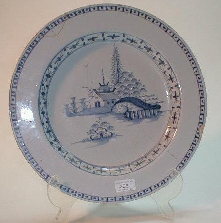 Appraisal: A Delft charger painted in blue the well simply painted