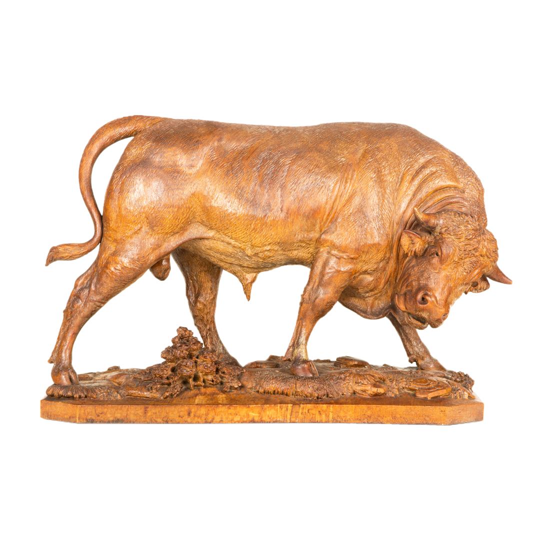 Appraisal: A BLACK FOREST FINELY CARVED LINDEN WOOD BULL A Black