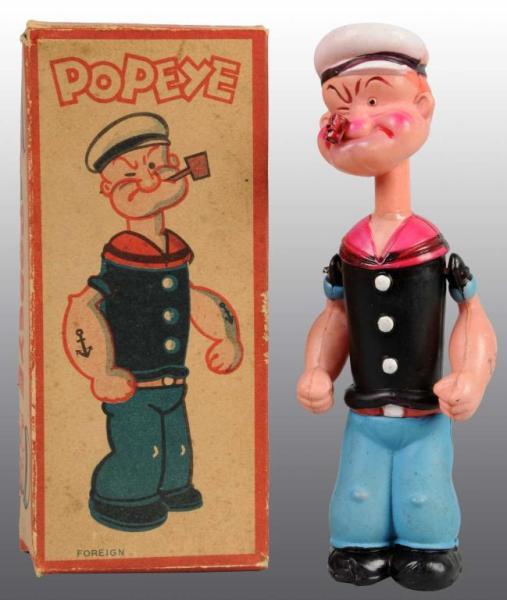 Appraisal: Celluloid Popeye Wind-Up Toy in Original Box Description Japanese Circa