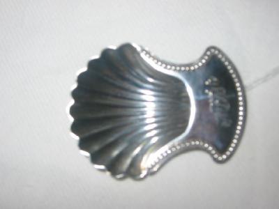 Appraisal: A GEORGIAN CADDY SPOON with shell bowl beaded lug handle