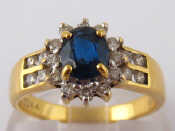 Appraisal: A yellow metal tests carat gold sapphire and diamond ring