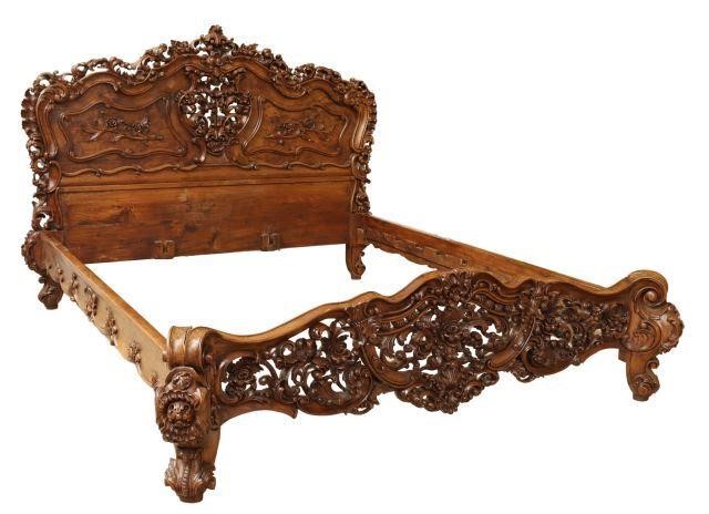 Appraisal: Baroque style walnut bed th c extensively carved headboard and