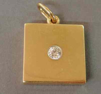 Appraisal: Square k gold locket with a pt diamond x