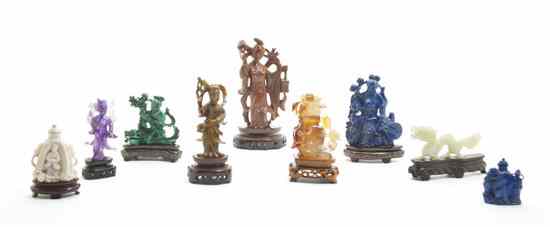 Appraisal: A Group of Eight Mineral Specimen Carvings comprising five figures