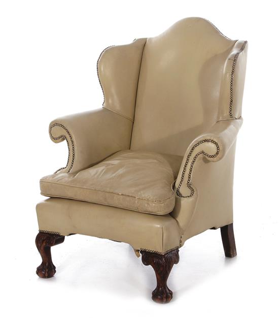 Appraisal: Chippendale style leather upholstered wingback chair BH SH W D