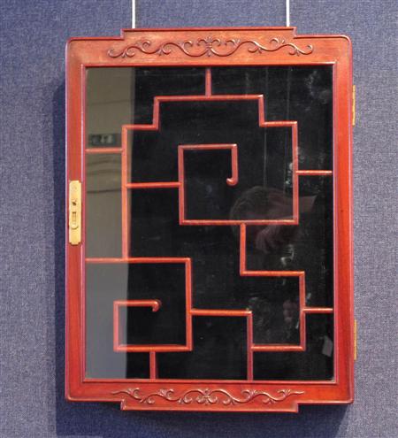 Appraisal: A Chinese rosewood wall hanging display case with glazed hinged