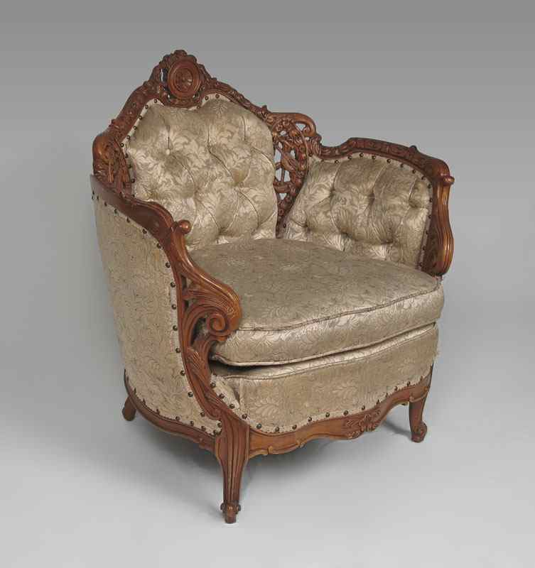 Appraisal: DEUTCH BROTHERS HEAVILY CARVED BARREL BACK CHAIR Profusely carved all