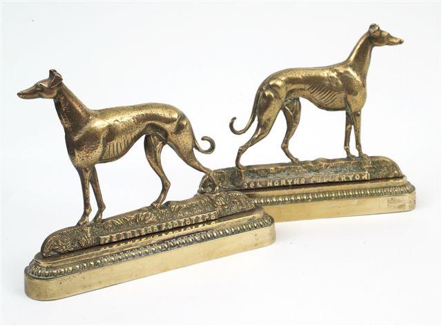 Appraisal: PAIR OF VICTORIAN BRASS GREYHOUND CHIMNEY ORNAMENTS each cast in