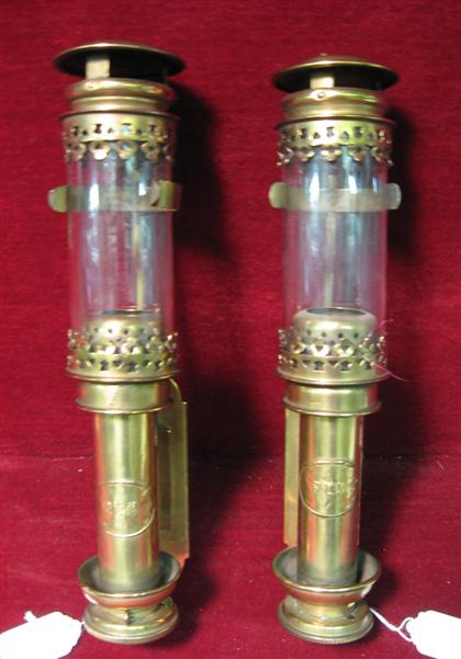 Appraisal: Pair of French brass and glass carriage lampsThe circular cap