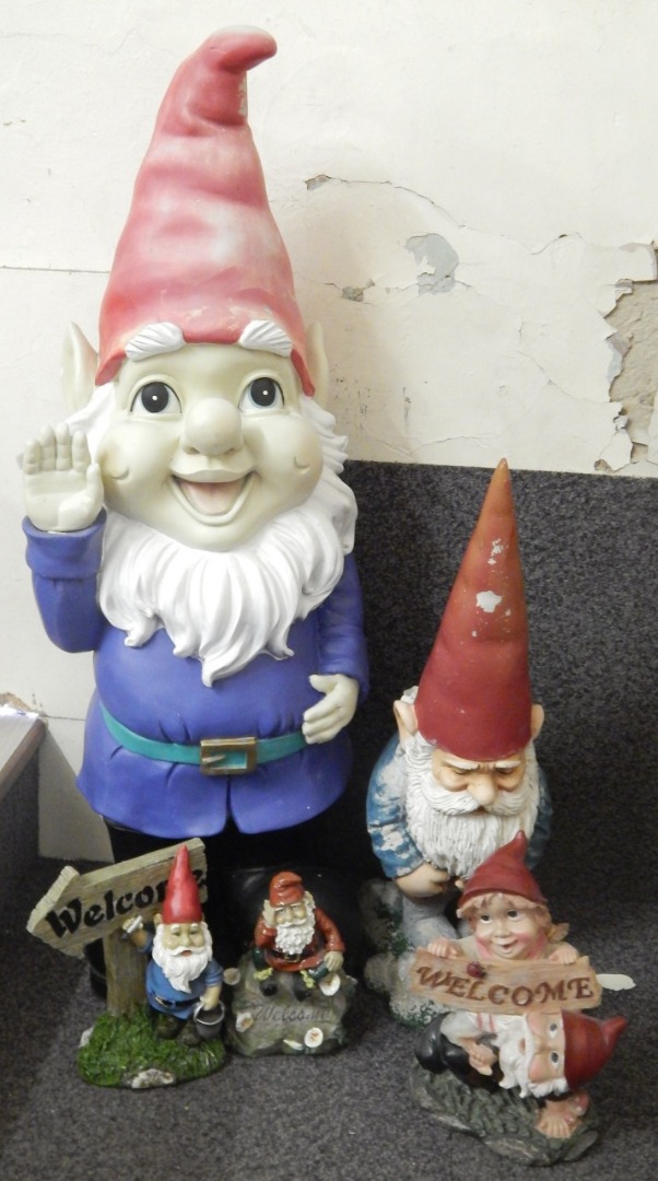 Appraisal: A large plastic gnome wearing a blue coat and typical