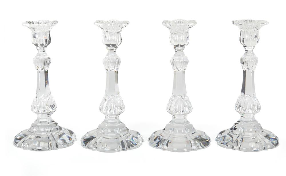 Appraisal: A set of four Baccarat crystal candlesticks Second-half th Century