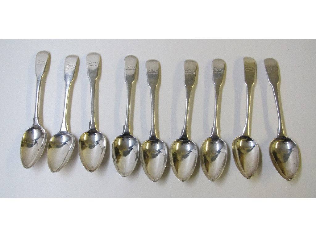 Appraisal: A set of nine George III silver dessert spoons engraved