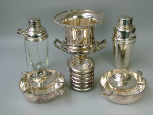 Appraisal: Two silver plated cocktail shakers of typical form one with