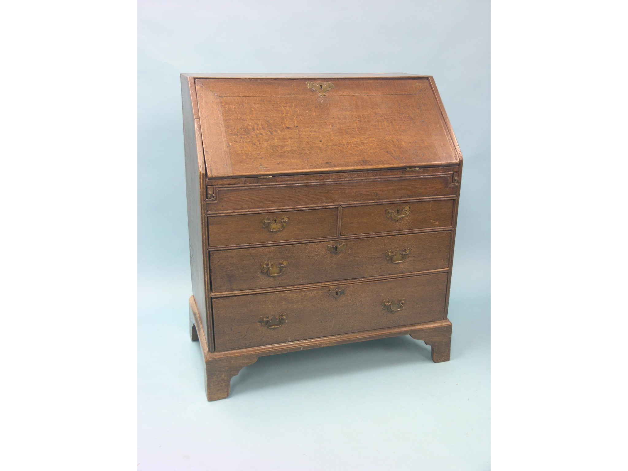 Appraisal: An early th century oak bureau stepped interior with central