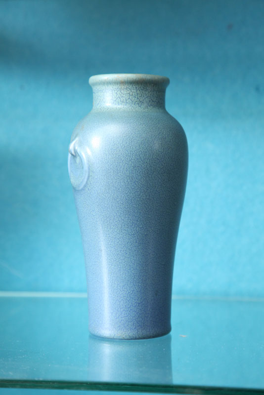 Appraisal: ROOKWOOD VASE Urn form with molded handles and blue matte