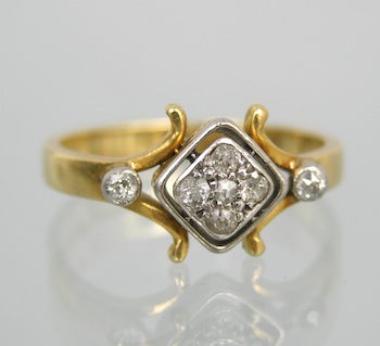 Appraisal: An Arts Crafts Diamond Cluster Ring k yellow gold ring