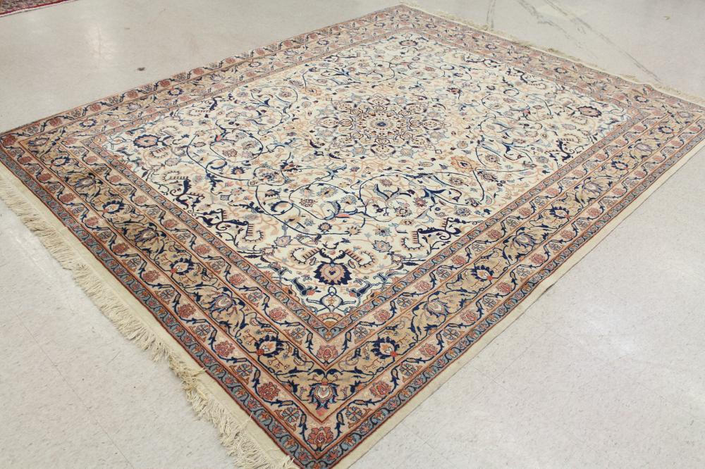 Appraisal: HAND KNOTTED ORIENTAL CARPET Indo-Persian floral and central floral medallion