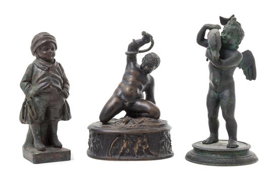 Appraisal: Sale Lot Three Cast Metal Figures comprising a figure depicting