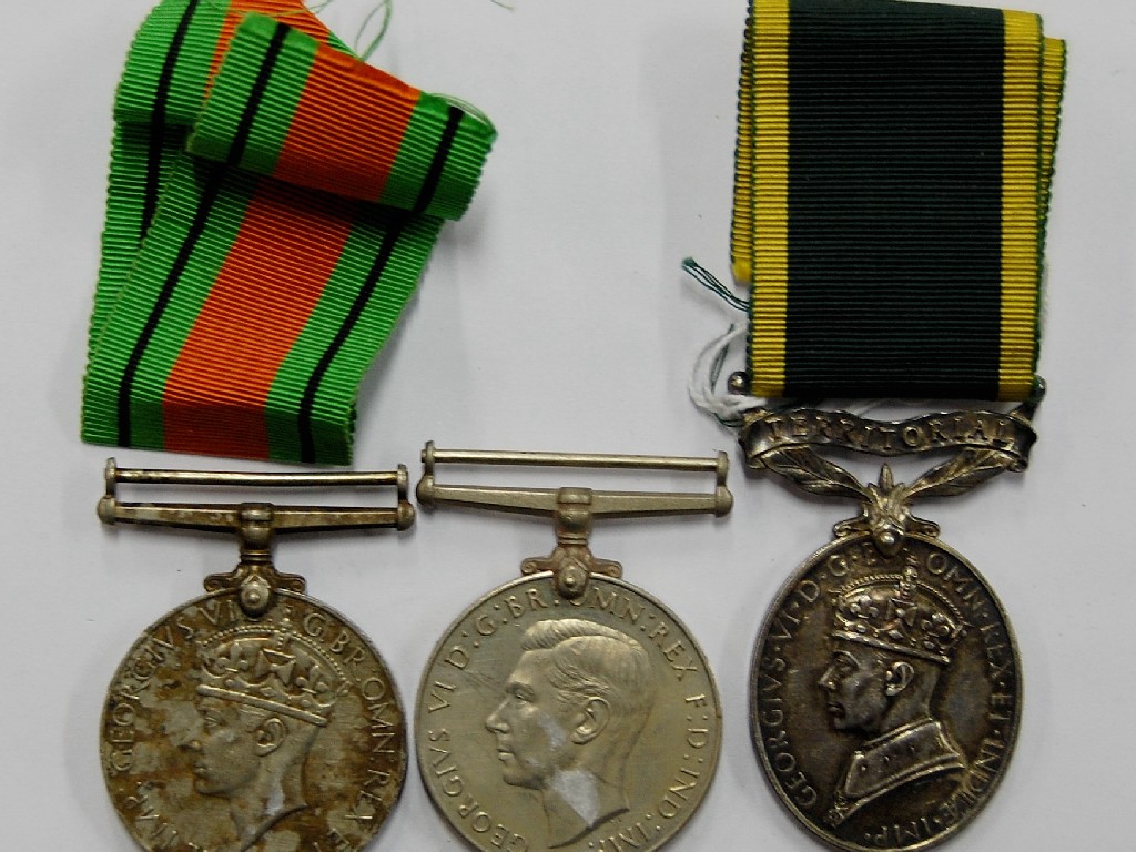 Appraisal: WWII medals comprising Defence and War Medal Territorial Efficiency Medal