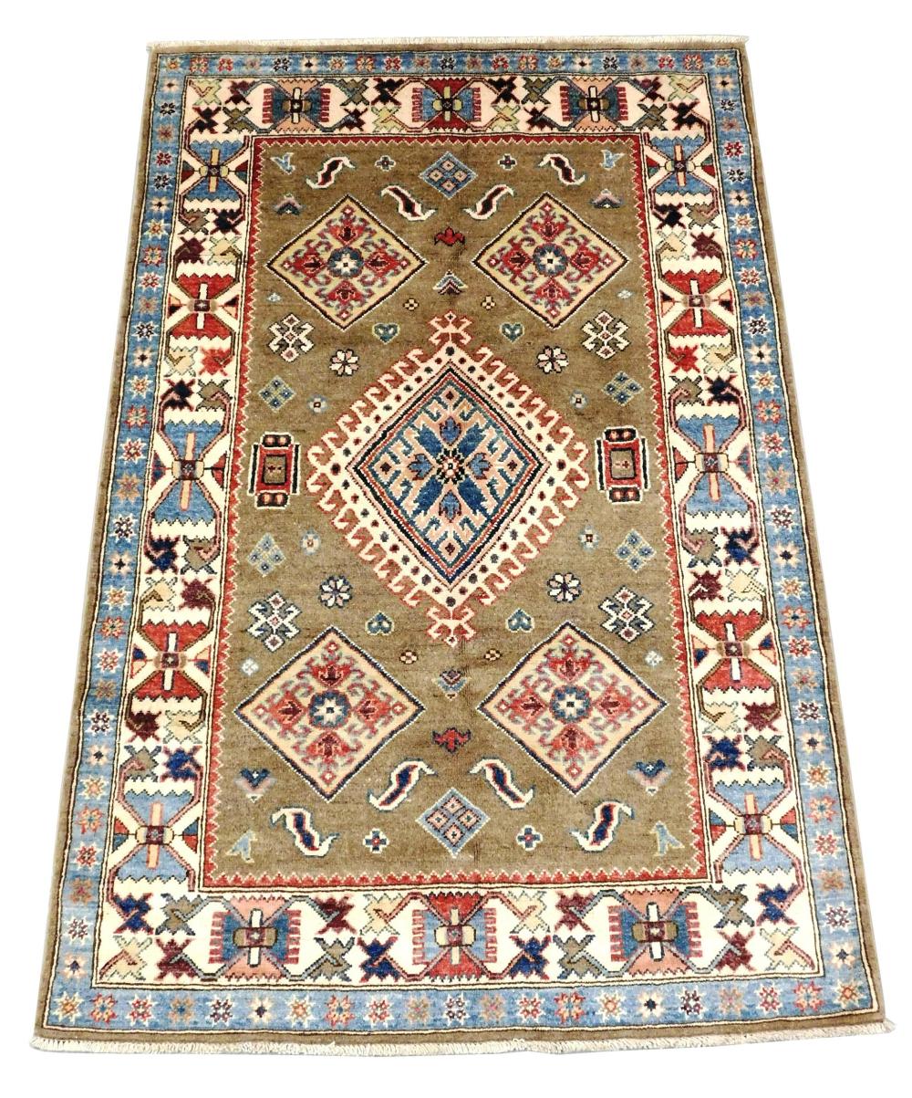 Appraisal: RUG Uzbek Kazak ' x ' handmade wool camel field