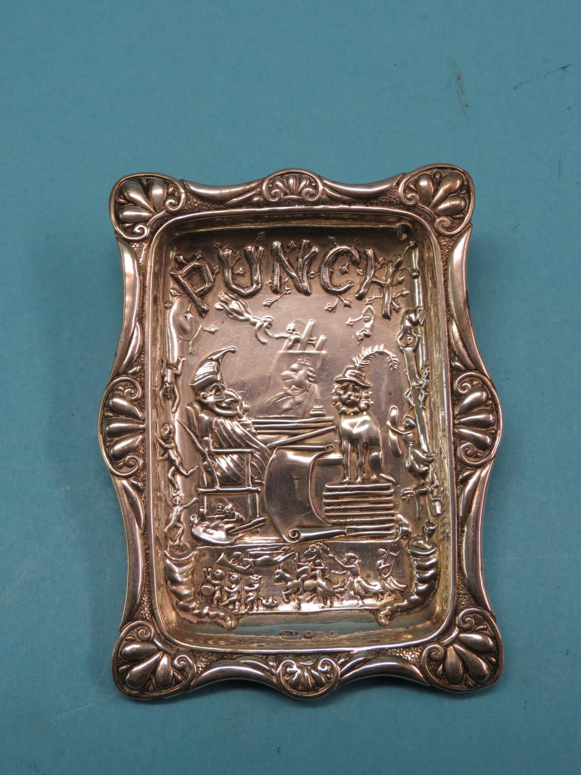 Appraisal: An unusual late Victorian silver pin-tray embossed with a Punch