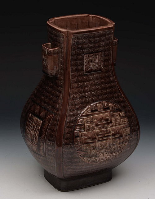 Appraisal: A CHINESE ARCHAIC STYLE ARROW SHAPED VASE of monochrome aubergine