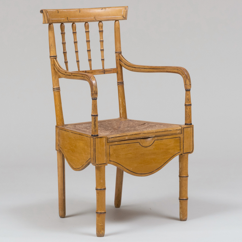 Appraisal: REGENCY YELLOW PAINTED FAUX BAMBOO AND RUSH COMMODE ARMCHAIR x