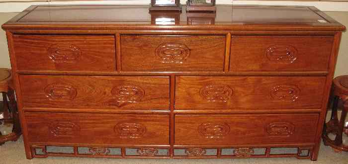 Appraisal: SOLID ROSEWOOD DRESSER Chinese th century featuring seven large drawers