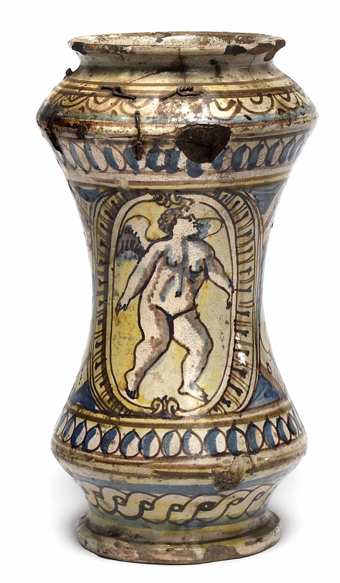 Appraisal: A Sicilian maiolica albarello th century Of waisted cylindrical form